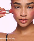 Sweet Treat Lip Oil in Coconut Cream – on model