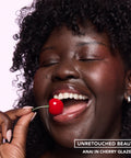 Sweet Treat Lip Oil in Cherry Glaze – on model