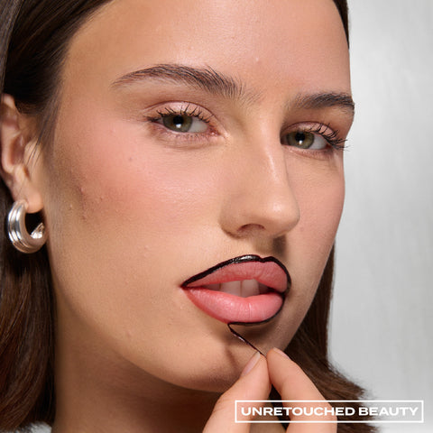 Peel-Off Lip Liner – on model, peeling off the liner