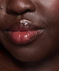 Sweet Treat Lip Oil in Cherry Glaze – on model
